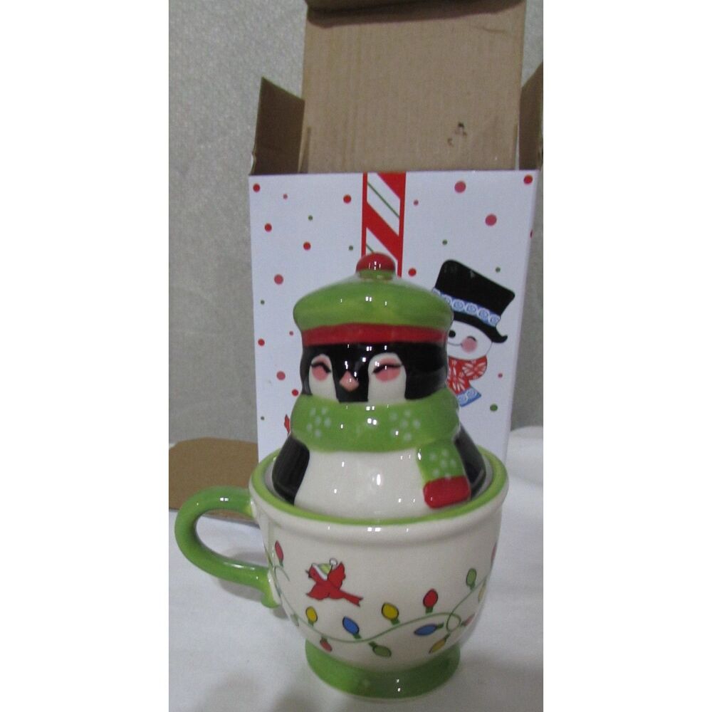 Salt and pepper shakers penguin in a teacup Temptations new in box green